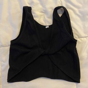 Twist front tank. Can be worn forwards or backwards!